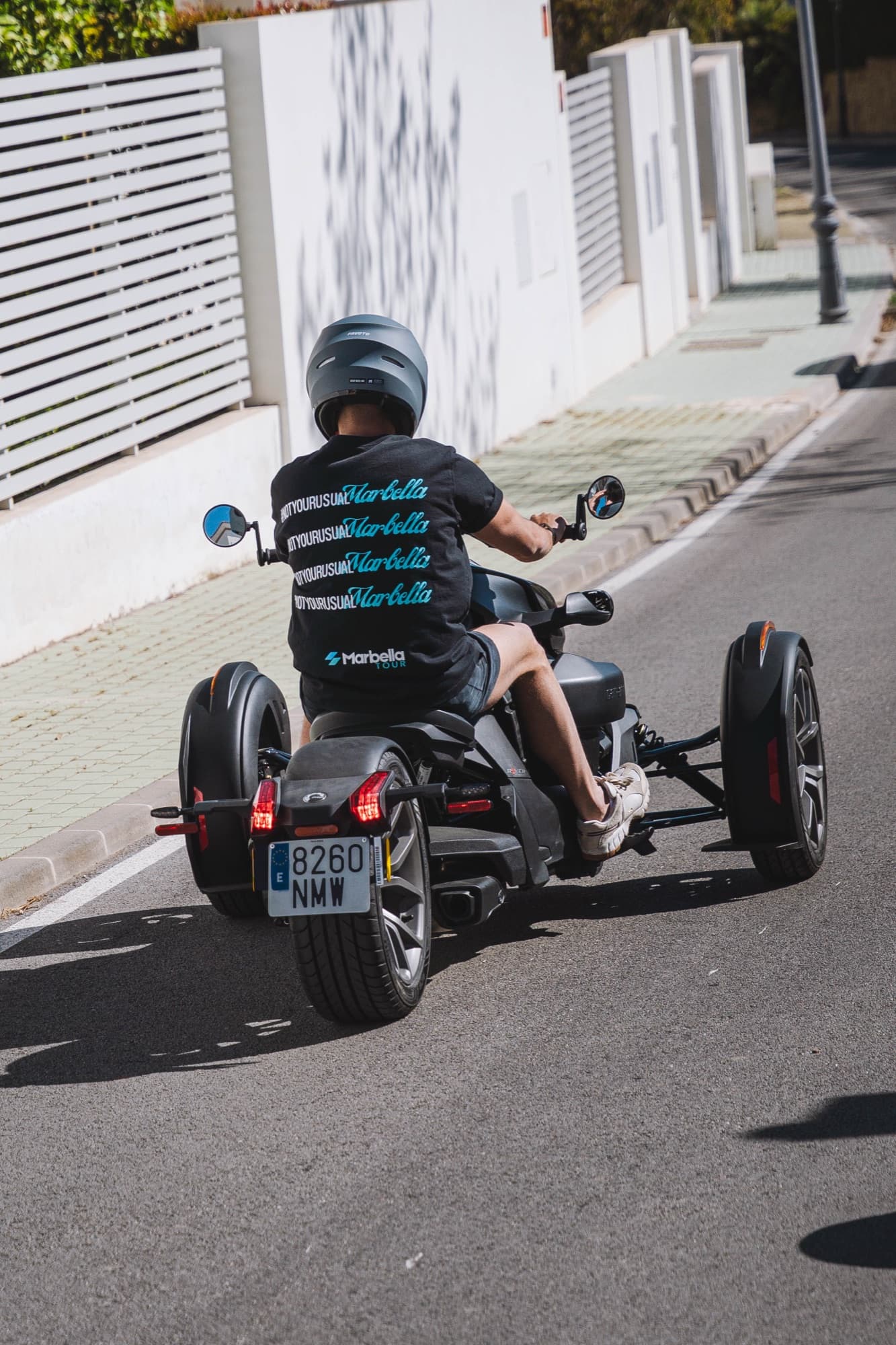 Rider on a Can-Am Ryker through the streets of Marbella